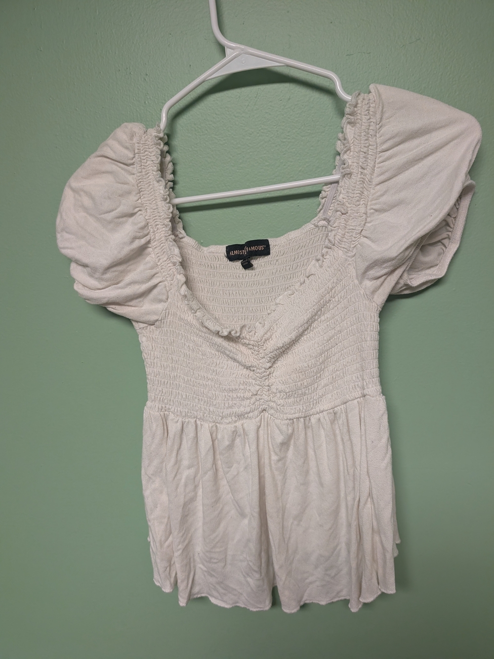 Almost Famous White Puff-Sleeve Smocked Peplum Top